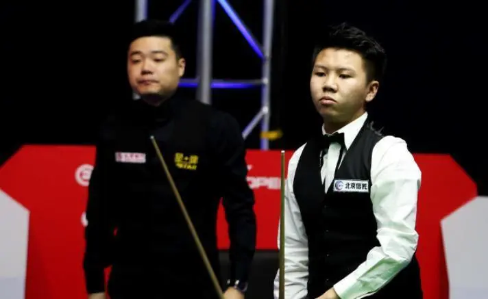 周跃龙, 马奎尔 周跃龙, 马奎尔